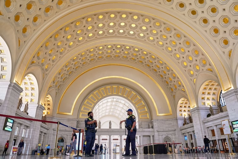 Amtrak police officers patrol Union Station in Washington, D.C., on Tuesday, Aug. 26, 2025.