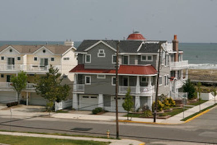 Shore homes off the beach in Ocean City. As beach homes have become more elaborate, costs have increased to insure them.