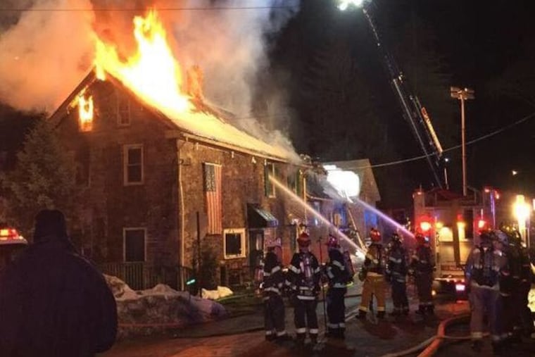 Firefighters battle blaze at the Sergeantsville Inn early Monday, March 9, 2015.