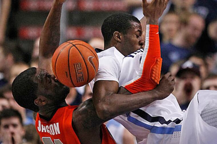 Neumann-Goretti alum Rick Jackson (left) played a big role in Syracuse's win over Villanova. (Ron Cortes/Staff Photographer)
