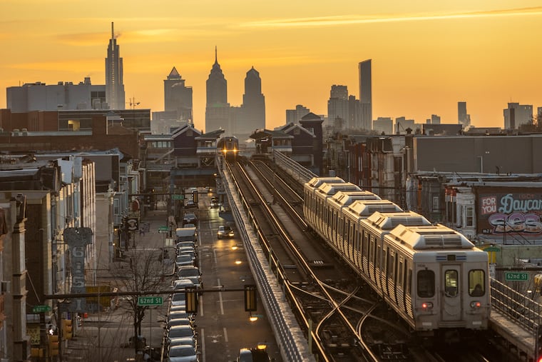 Trains make their way by the 63rd Street SEPTA Station on the Market-Frankford Line.