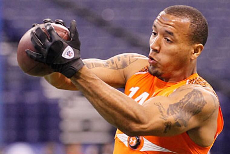 Notre Dame wide receiver Michael Floyd ran a 4.46 in the forty-yard dash at the NFL scouting combine. (Dave Martin/AP)