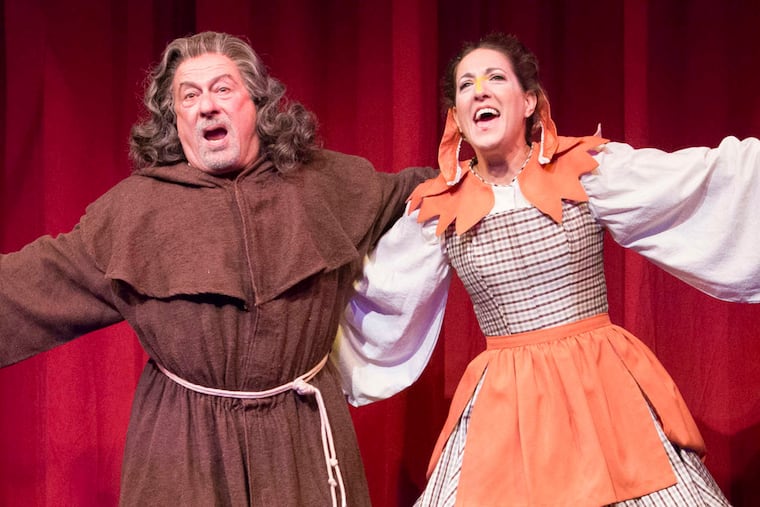 Tom Teti is Aramis and Leah Walton is Henrietta the Chicken in "The Musketeers (The Later Years): A Musical Panto" at People's Light in Malvern.