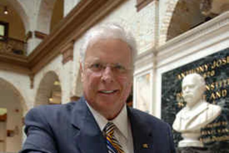 The late Constantine Papadakis, here in a June 2008 photo, has inspired builder Richard Goodwin to propose a peace institute in his name.