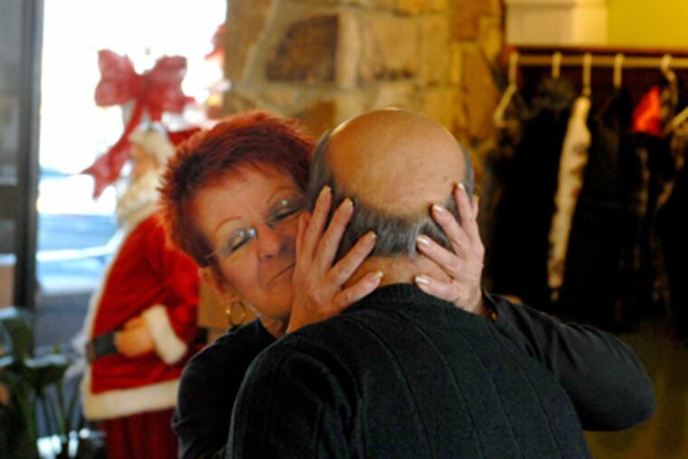 Tina Brown greets a former Newton Diner customer arriving for breakfast at her new workplace, the Metro Diner in Brooklawn. (Tom Gralish / Staff Photographer)