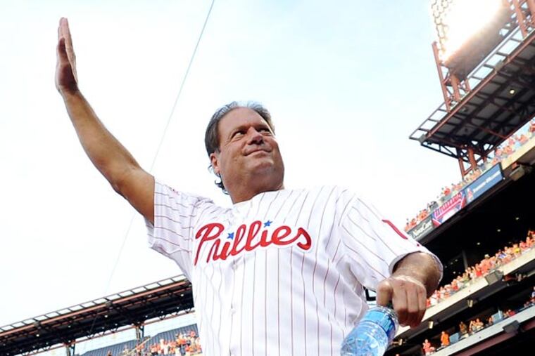 Darren Daulton walks to the field during the Phillies alumni ceremonies before the start of a baseball game against the Atlanta Braves on Friday, Aug. 2, 2013, in Philadelphia. Daulton was recently diagnosed with a brain tumor. (Michel Perez/AP)