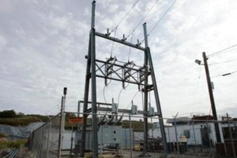 Power lines connected to generators powered by methane transfer electricity to the power grid next to the Kingsland landfill in Lyndhurst, N.J. Twenty-one sites in the state use the process.