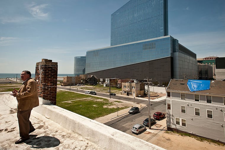 Charlie Birnbaum stands on the roof of his parents home at 311 Oriental Avenue in Atlantic City, overlooking the Revel casino. Revel is now known as the Ocean Resort Casino.
