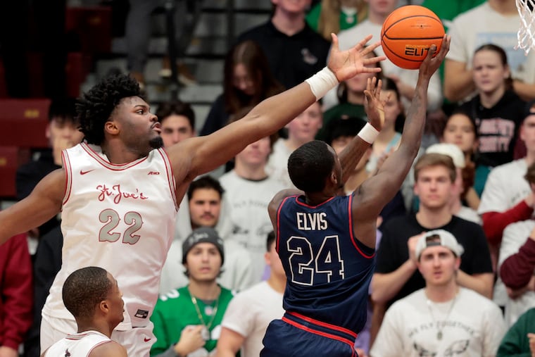 Christ Essandoko (left) averaged 8.2 points and 5.7 rebounds across 25 games for the Hawks.