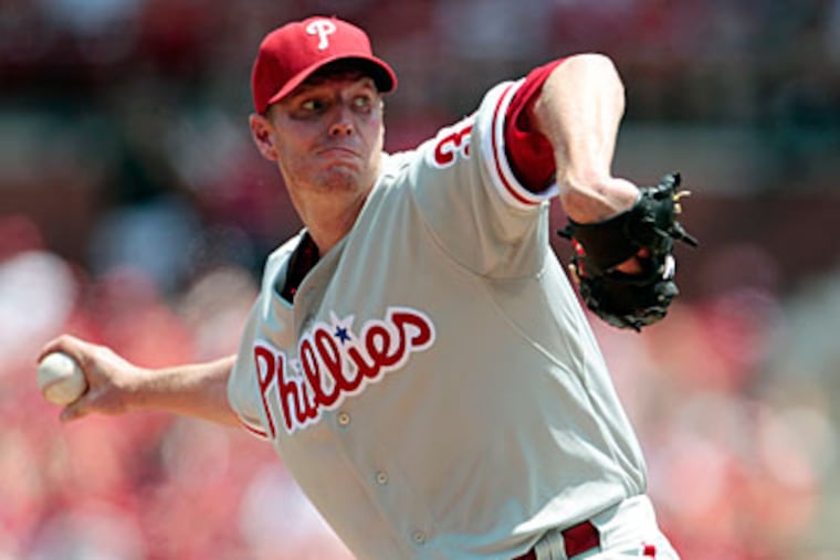 "We'll keep advancing it and get as close to getting in a game as I can," Phillies ace Roy Halladay said. (Jeff Roberson/AP)