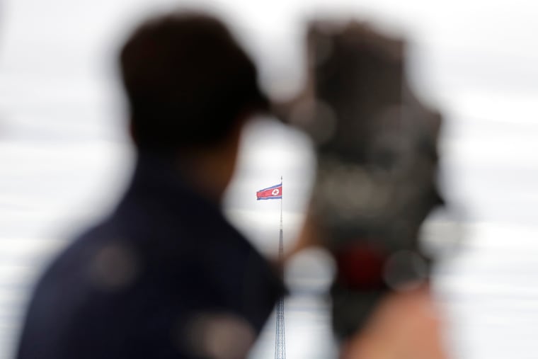 FILE - A North Korean flag flutters in the wind atop a 160-meter tower in North Korea's village Gijungdong as seen from the Taesungdong freedom village inside the demilitarized zone in Paju, South Korea on April 24, 2018.