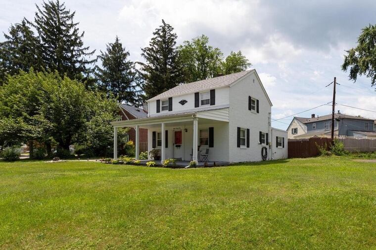 The homeowners were attracted by the large lot and front porch of this home in Secane in Delaware County.