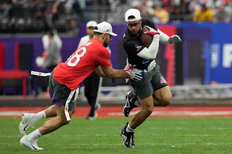 Eagles running back Saquon Barkley (right) took part in the flag football event at the 2023 Pro Bowl Games as a member of the Giants. He's scheduled to also take part in the Fanatics Flag Football Classic later this month.