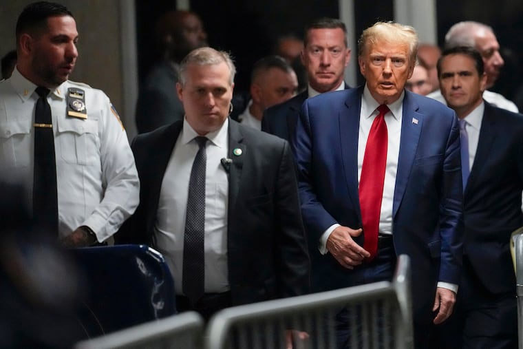 Former President Donald Trump leaves Manhattan criminal court in February in New York.