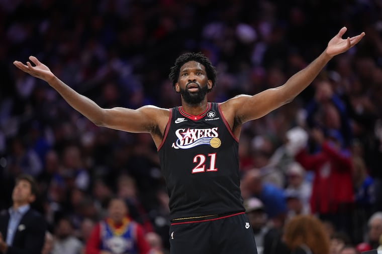 Philadelphia 76ers' Joel Embiid reacts during the first half of Game 4 against the Boston Celtics in a first-round NBA basketball playoffs series Sunday, April 26, 2026, in Philadelphia. (AP Photo/Matt Slocum)