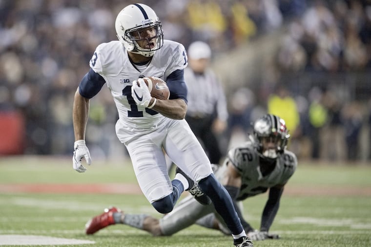 Penn State wide receiver Saeed Blacknall runs down the field away from Ohio State cornerback Denzel Ward on Oct. 28.