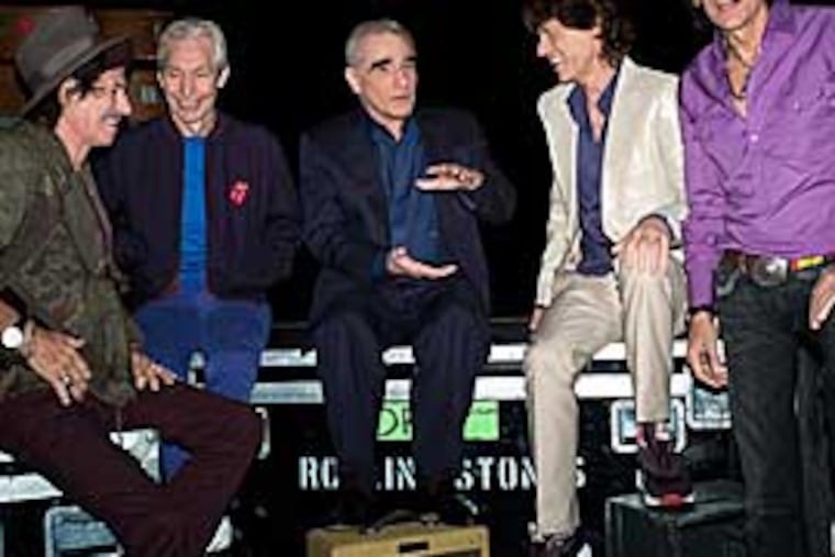 From left: Keith Richards, Charlie Watts, Director Martin Scorsese, Mick Jagger and Ronnie Wood during filming of the Rolling Stones concert film “Shine A Light.”