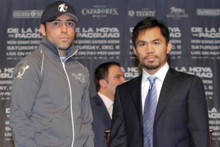 "This is the fight of my life," Manny Pacquiao (right) said of stepping into the ring with Oscar De La Hoya (left). Pacquiao has won world titles in several weight divisions.
