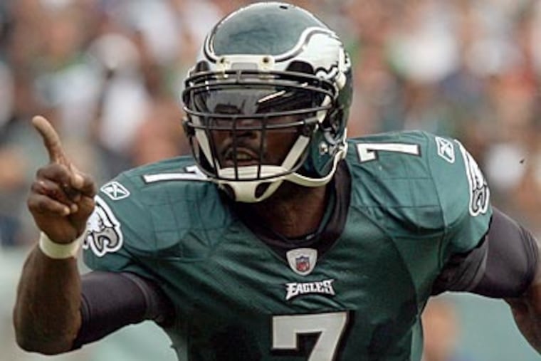 Michael Vick left Sunday's game against the Giants with a deep bone bruise. (Yong Kim/Staff Photographer)