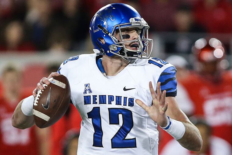 Memphis Tigers quarterback Paxton Lynch (12) prepares to throw the ball during the third quarter against the Houston Cougars at TDECU Stadium. The Cougars won 35-34.
