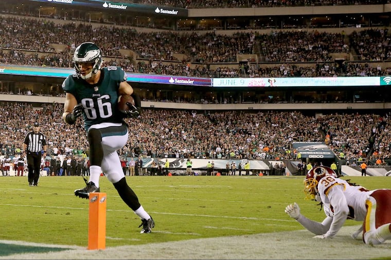 Zach Ertz leads all tight ends with five touchdowns. He scored this one after shrugging off helpless Redskins defensive back D. J. Swearinger near the goal line.