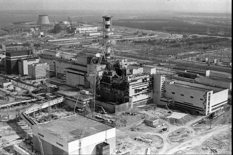 The Chernobyl nuclear plant is seen in an aerial view, showing the damage from an explosion and fire on April 26, 1986, that sent a radioactive plume over Europe.