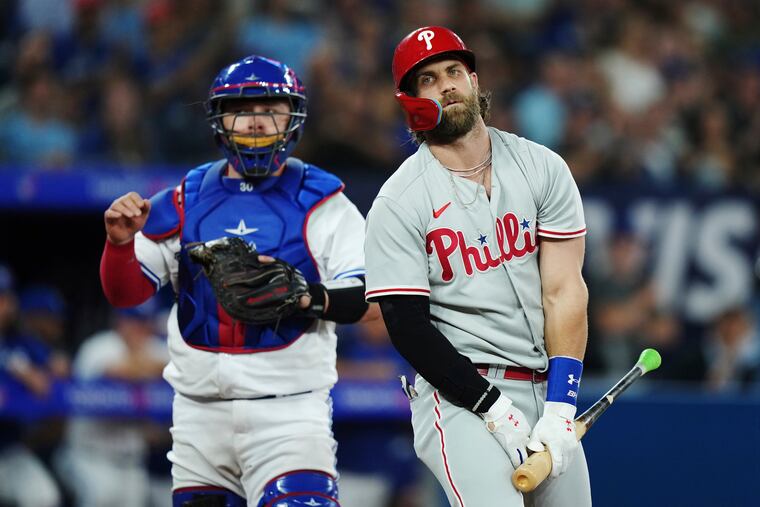 Bryce Harper served as designated hitter on Tuesday against the Blue Jays in Toronto.