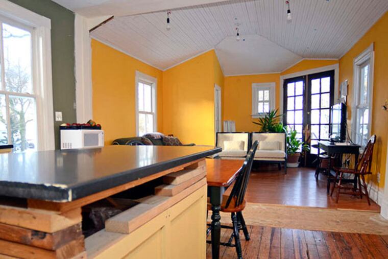 The kitchen and dining area in the home of Paul Keifrider and Victoria Elizabeth Barnes, still under construction. (TOM GRALISH / Staff Photographer)