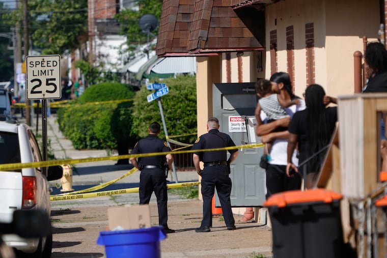 Police are at the scene of a shooting inside Delaware County Linen on West Fourth Street in Chester on Wednesday.