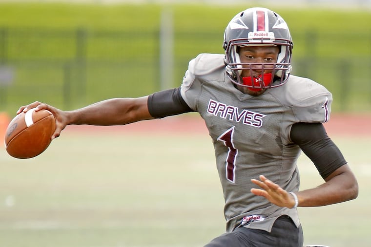 Bartram quarterback Mahmud Dioubate scrambles during a game against Archbishop Ryan earlier this season.