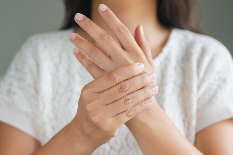 Rheumatoid arthritis leads to painful joint inflammation, often in the hands and wrists.