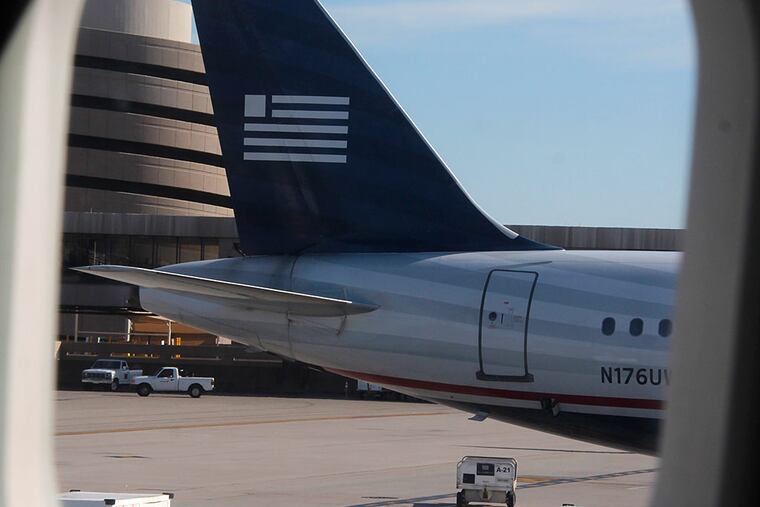 A USAirways Airbus 319 aircraft in Phoenix, one of the stops on the final US Airways flight. GENE J. PUSKAR / Associated Press