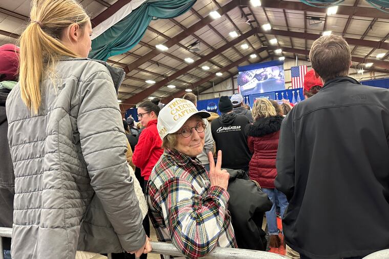 Jackie Garlock, of Clear Lake, Iowa, wears a white hat indicating her status as one of Donald Trump's "caucus captains" while attending his rally in Mason City, Iowa, on Friday. (AP Photo/Steve Peoples)