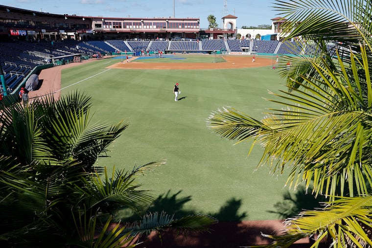 Nick Castellanos of the Phillies walking the outfield during batting practice at BayCare Ballpark in Clearwater, Fla., last March.