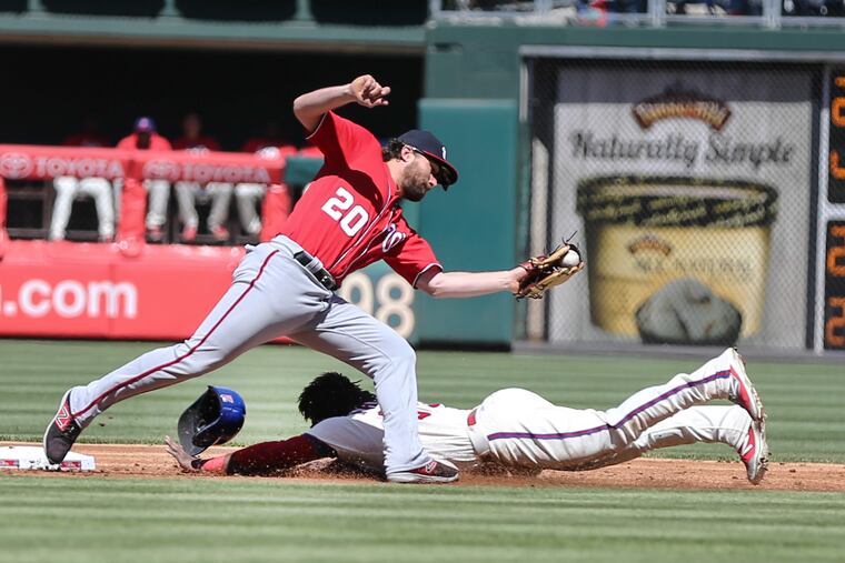 Daniel Murphy (left) is headed to the Cubs as the Nationals unloaded two players in an apparent attempt to wave the white flag on the season.