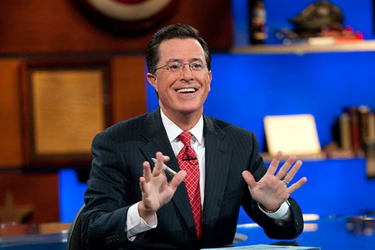 Stephen Colbert appears during " The Colbert Report," in New York. (AP Photo/Comedy Central, Scott Gries)