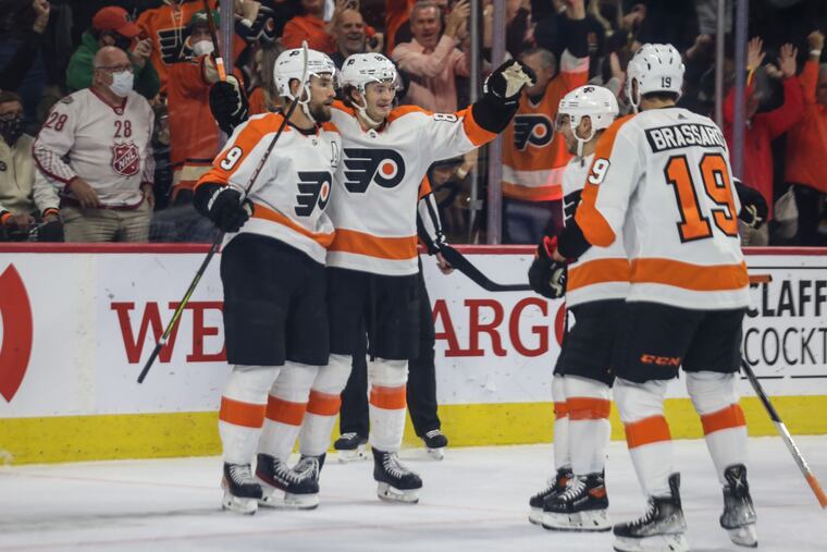 Flyers Joel Farabee, center celebrates his goal against the Bruins with teammates during the first period at the Wells Fargo Center in Philadelphia, Wednesday, October 20 2021.