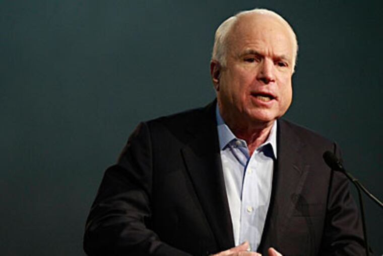 U.S. Sen. John McCain, R-Ariz., addresses the crowd during a campaign rally Saturday, March 27, 2010 in Mesa, Ariz. (AP Photo/Matt York)