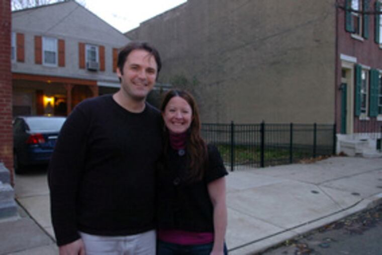 "It started to dawn on me that there's nothing good about" the casinos, said Bob Sola, with fiancee Maureen Duffy outside his Fishtown home.