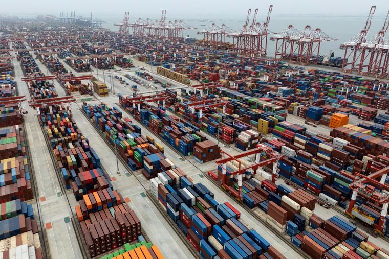 Shipping containers are seen ready for transport at the Guangzhou Port in southern China's Guangdong province on April 17, 2025.