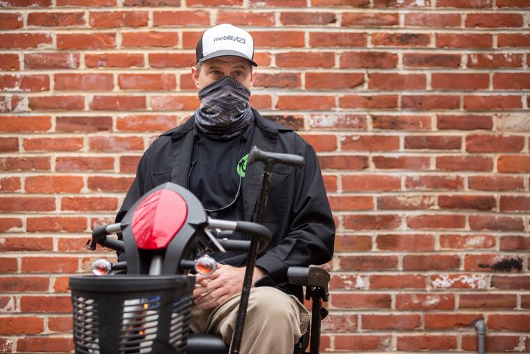 Kevin Cook outside his Cherry Hill home