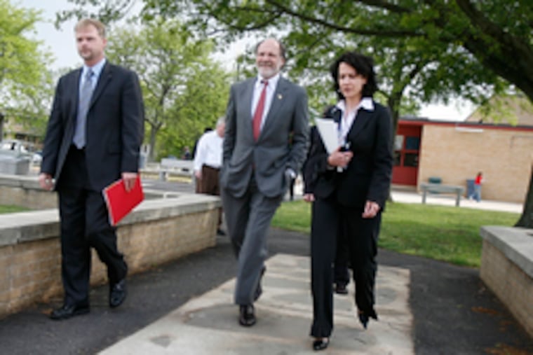 Kevin Martone (left), Mental Health Services assistant commissioner; Gov. Corzine; and Human Services commissioner Jennifer Velez visited Ancora Psychiatric Hospital in Winslow Township.