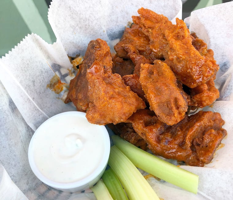 Triangle Tavern's spicy seitan wings are the South Philly spot's top-selling menu item.