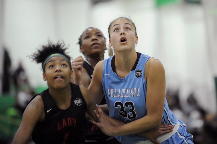 Kylee Watson (right) looks for the rebound during the 2017 Boo Williams Nike Girls Invitational in Hampton, Va. She led Mainland to a win on Saturday.