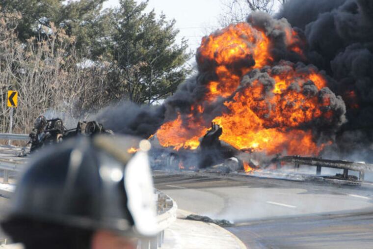 A tank truck accident that occurred in Pennsauken near the Betsy Ross Bridge on Feb. 23 is costing $1 million in damage to the roadway, guardrail, and light fixtures. (CURT HUDSON / For the Inquirer)