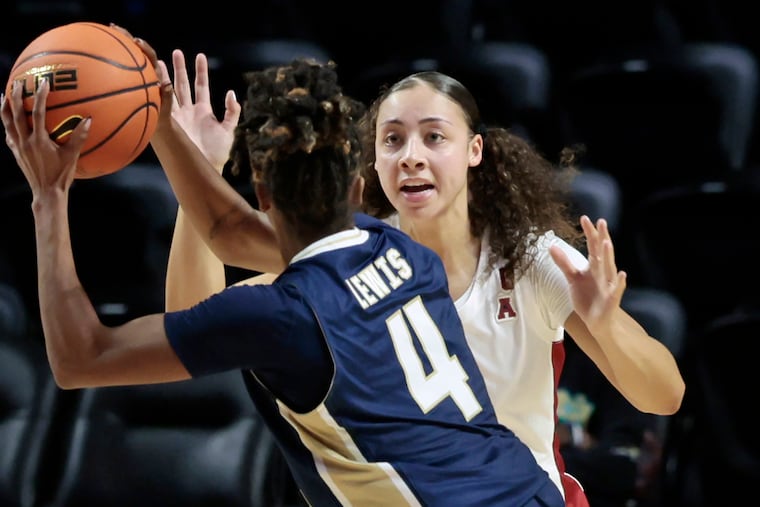 Temple’s Jaleesa Molina defends against George Washington's Sara Lewis on Nov. 7.