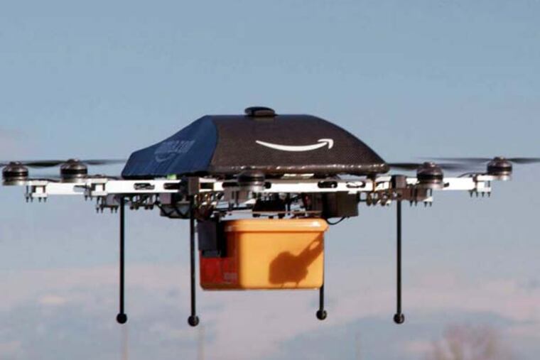 This undated image provided by Amazon.com shows the so-called Prime Air unmanned aircraft project that Amazon is working on in its research and development labs. Amazon says it will take years to advance the technology and for the Federal Aviation Administration to create the necessary rules and regulations, but CEO Jeff Bezos said Sunday Dec. 1, 2013, there's no reason Drones can't help get goods to customers in 30 minutes or less. (AP Photo/Amazon)