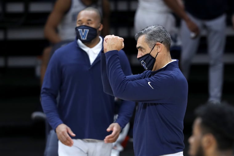 Coach Jay Wright, right, of Villanova after their 85-66 victory over Butler on Dec. 16, 2020 at the Finneran Pavilion at Villanova University. It was his 600th career win.