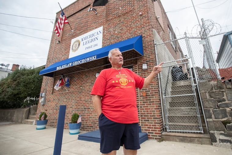 Bridesburg American Legion Post 396 Commander Pat Driscoll stands before the newly built post that was three years in the making after their old post burned to the ground.