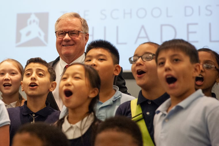 Republican nominee for governor Scott Wagner poses for a photo with students from the Anne Frank Elementary School after a gubernatorial forum.